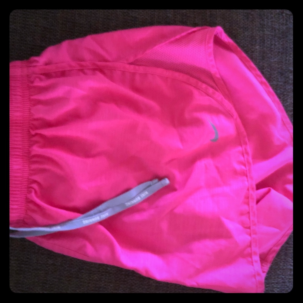 Hot pink Nike running shorts